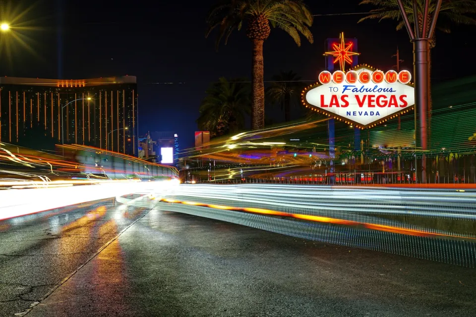 "Welcome to Fabulous Las Vegas Nevada" sign at night.